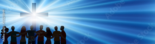 Silhouette group of people praying at the bright Christian cross. Concept Resurrection Jesus Christ. Easter. Crucifix with light rays. Spirituality. Rescue. Forgiveness. Dark. Copy space