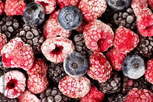 Bunch of frozen berry fruit background pattern photo