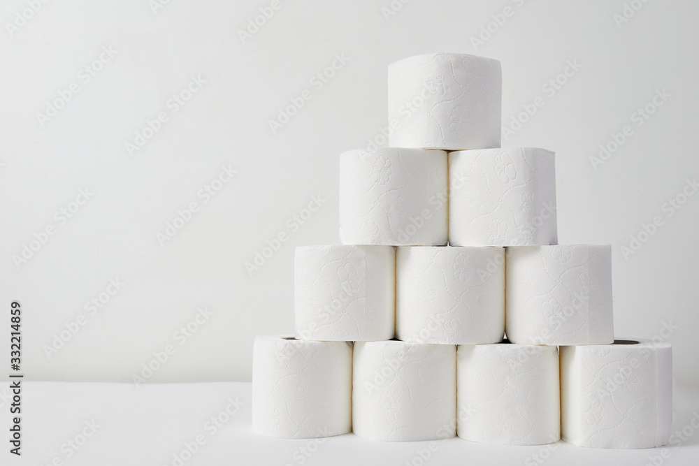 Toilet paper on white background. The panic of the coronavirus epidemic Toilet paper on white background. The panic of the coronavirus epidemic