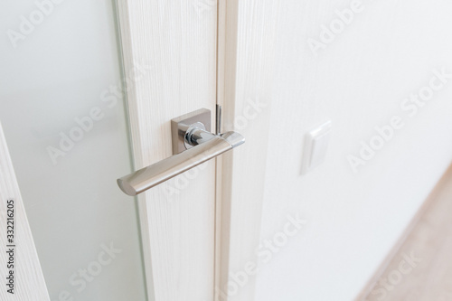 stylish doorknob and door in a design apartment