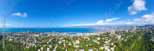 Aerial panoramic view of Haifa, Israel skyline, showing houses on central Carmel area and full view of the. city bay.