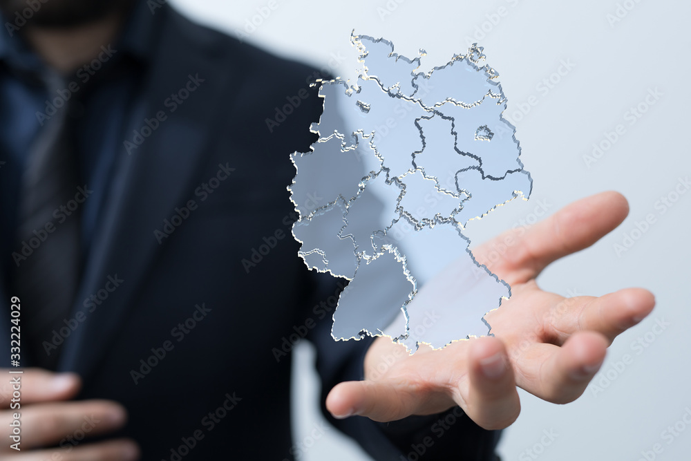 a virtual germany land map digital in hand 3d a virtual germany land map digital in hand 3d