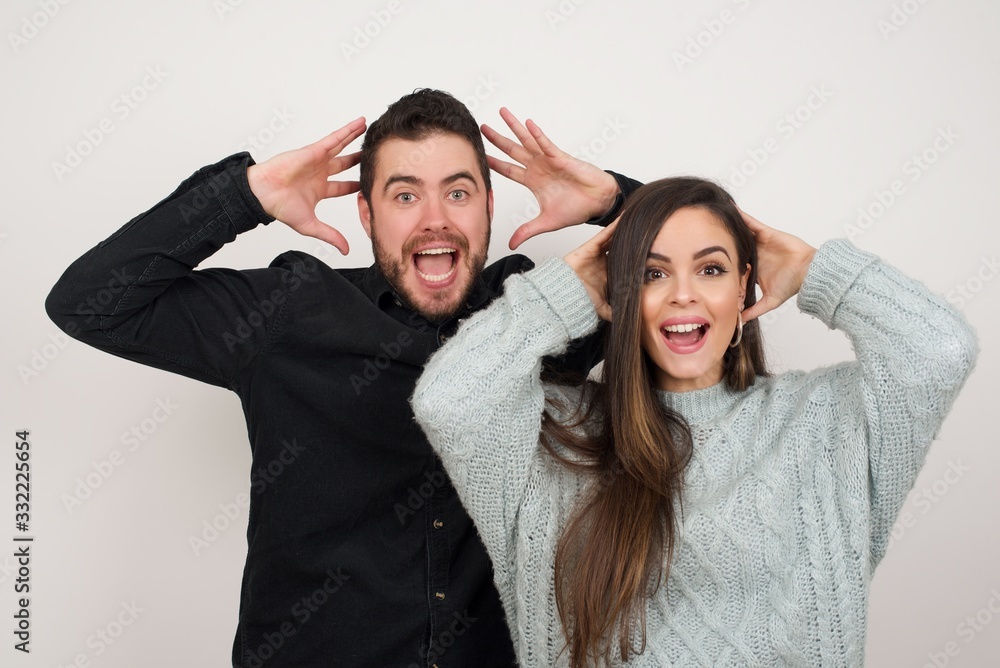 Excited overjoyed woman screams after recieving good news, keeps hands ...