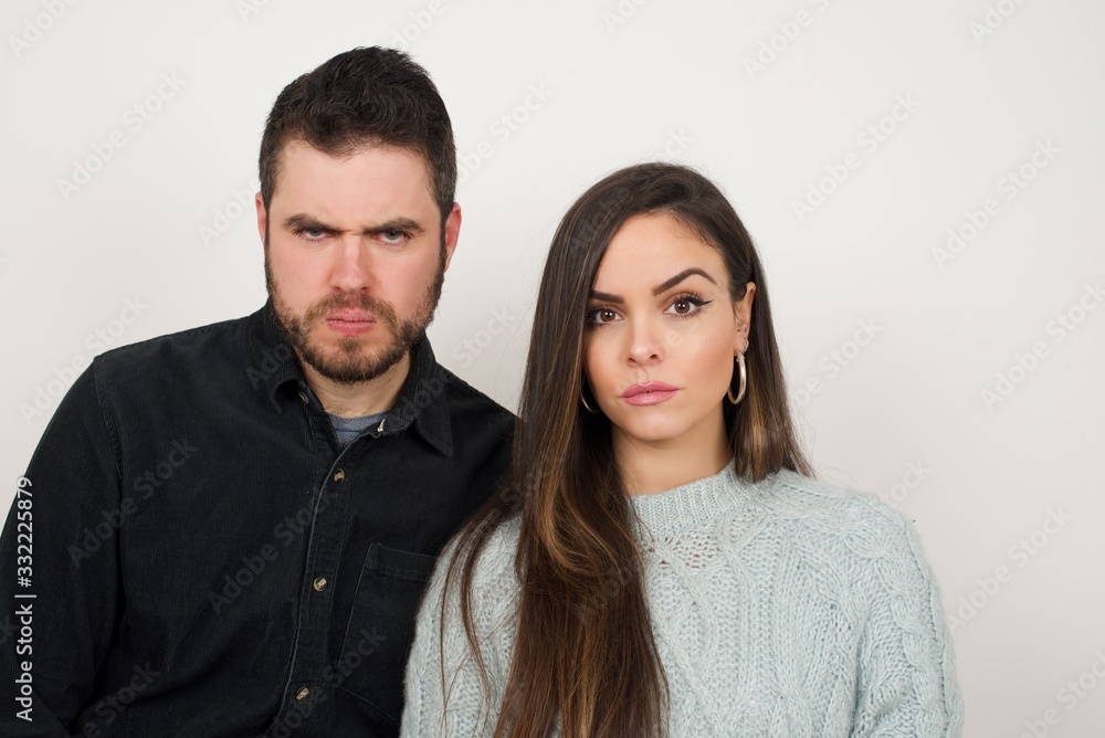 Portrait of outraged young woman with oval face, frowning her eyebrows being displeased with something. Portrait of outraged young woman with oval face, frowning her eyebrows being displeased with something.
