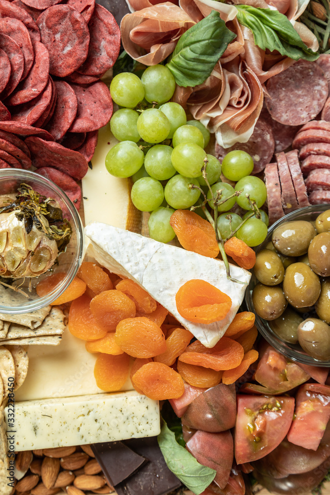 Close up Top Down Gourmet Charcuterie Board. Flat Lay with Selective focus.