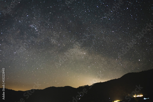 night sky with stars and clouds