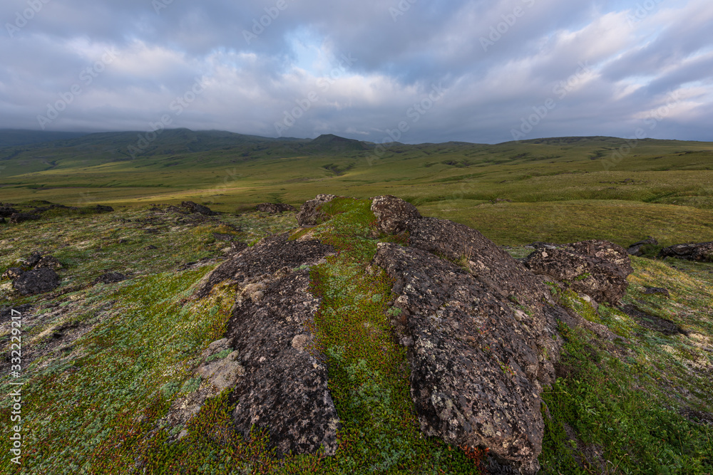 Dramatic views of the volcanic landscape. Kamchatka Peninsula. Dramatic views of the volcanic landscape. Kamchatka Peninsula.