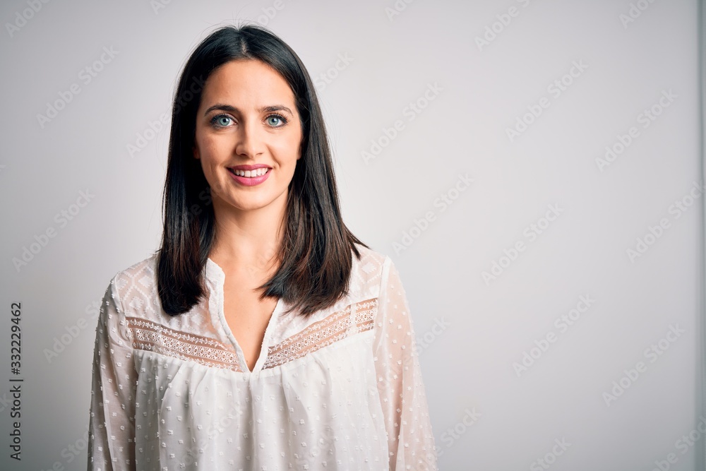 Young brunette woman with blue eyes wearing casual t-shirt over isolated white background with a happy and cool smile on face. Lucky person. Young brunette woman with blue eyes wearing casual t-shirt over isolated white background with a happy and cool smile on face. Lucky person.