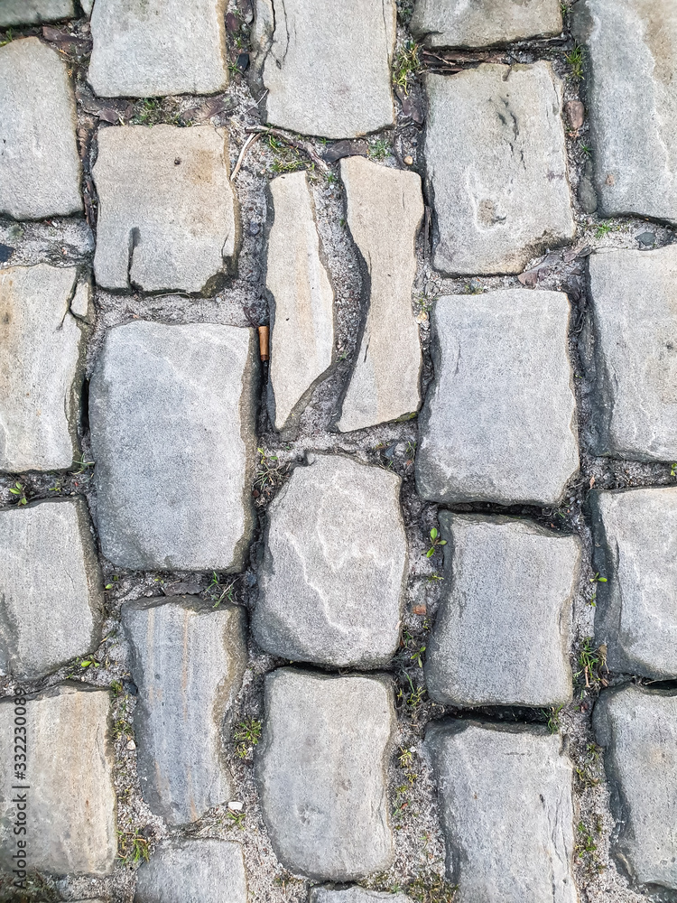 Obraz premium background texture street of cobble stones or paving stones