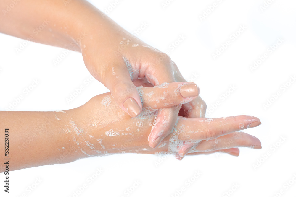 Close up of washing hands with soap isolated on white background Coronavirus prevention hand hygiene. Corona Virus pandemic protection by cleaning hands frequently. Close up of washing hands with soap isolated on white background Coronavirus prevention hand hygiene. Corona Virus pandemic protection by cleaning hands frequently.