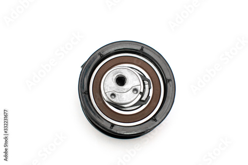 Car belt tensioner isolated on the white background. Spare parts.