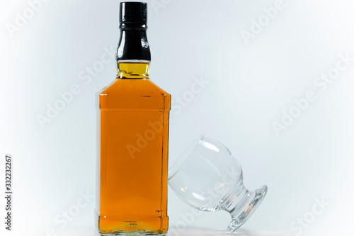 Whiskey bottle and cross-standing glass based on the bottle. ,