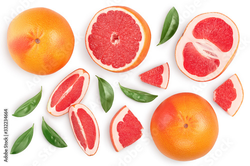 Fototapeta Naklejka Na Ścianę i Meble -  Grapefruit and slices with leaves isolated on white background. Top view. Flat lay. With clipping path and full depth of field