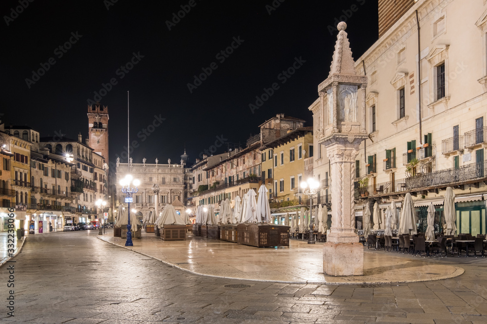 VERONA, ITALY-APRIL 21, 2019: View on Piazza delle Erbe at night, the square in Verona, Veneto, Italy