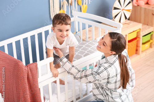 Nanny and cute little boy i...