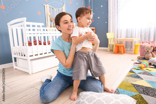 Nanny and cute little boy a...