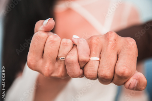 the intertwining of the hands of the bride and groom
