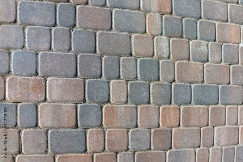 masonry wall paving stones as a background close up