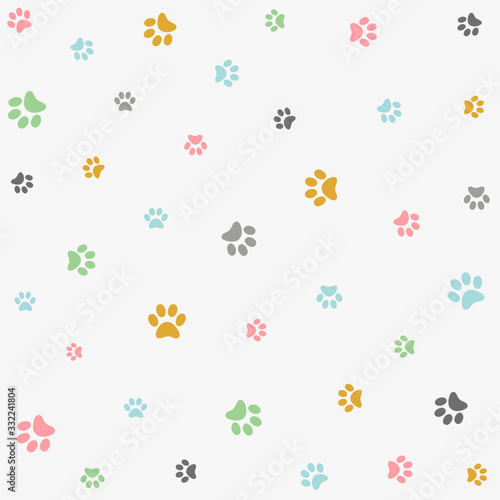 Seamless pattern with colorful animal foot prints, paws