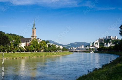 Salisburgo by the river with a Church © graphicfootage
