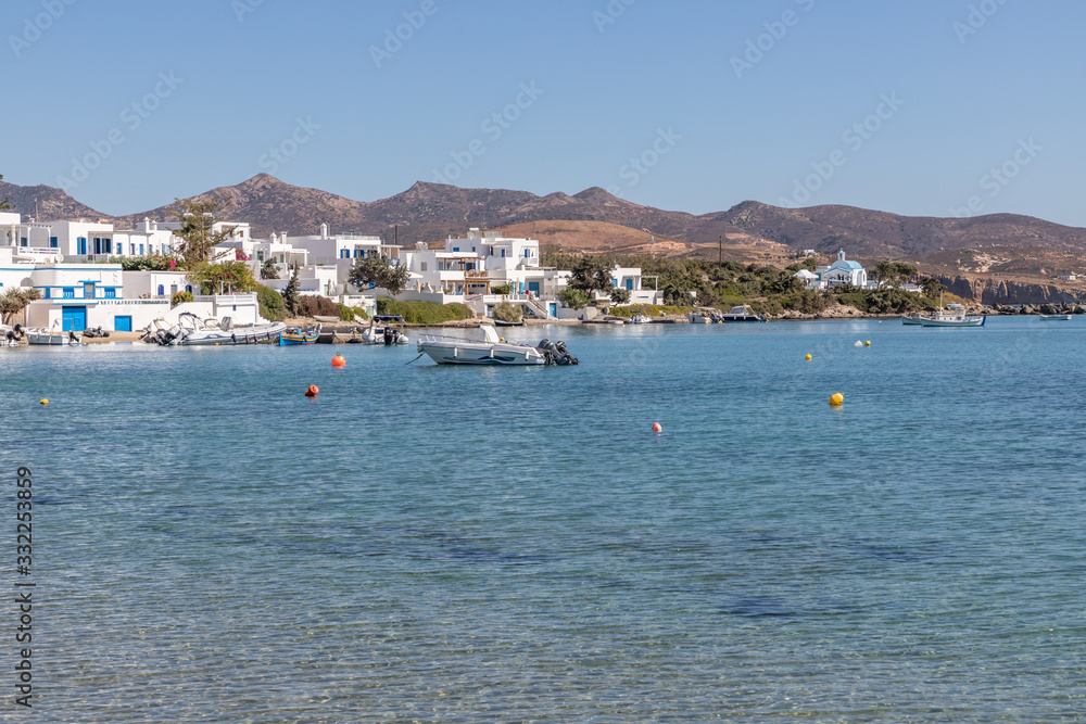 Village and boats in Pollonia beach Village and boats in Pollonia beach