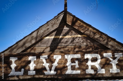 Photographs on signs in Pioneer Town. photo