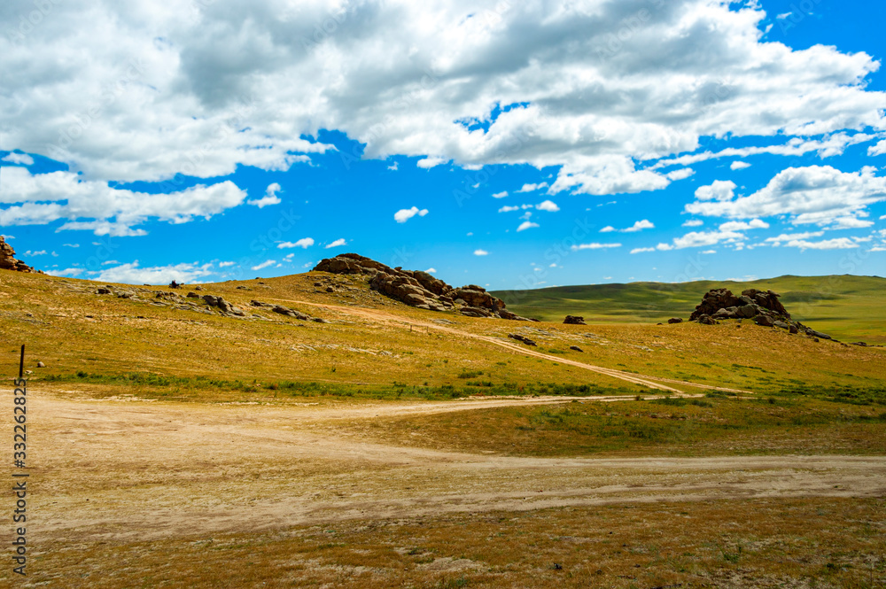 View of scenic Mongolian steppe, a homeland of Ginggis Khan and nomadic traditions