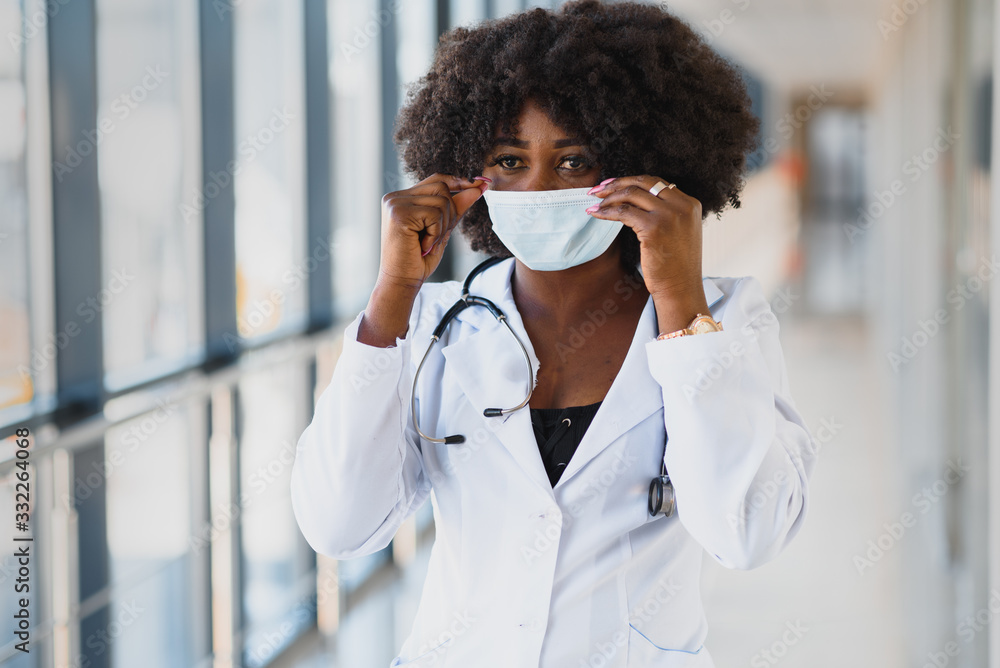 Young attractive african doctor with face mask Young attractive african doctor with face mask