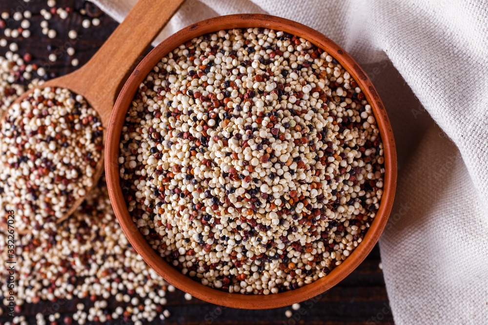 mix of quinoa grains on dark wooden rustic background mix of quinoa grains on dark wooden rustic background