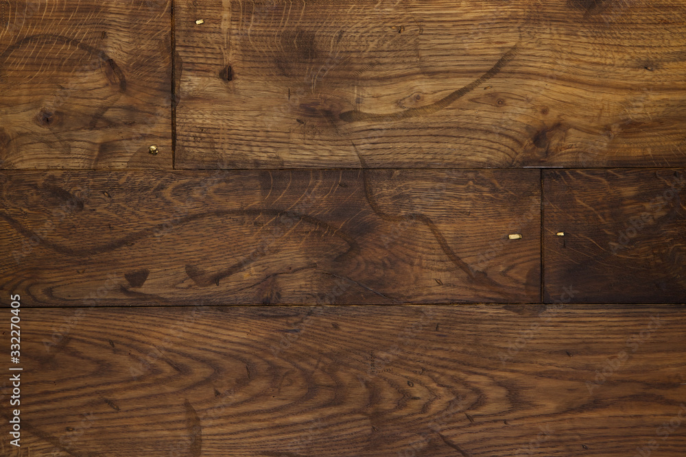 Fototapeta premium Natural wooden texture. New oak parquet. Wooden laminate floor boards background image. Polished oak pattern.