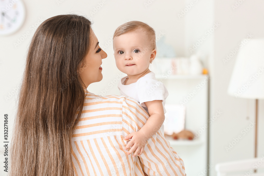 Happy mother with cute little baby at home Happy mother with cute little baby at home