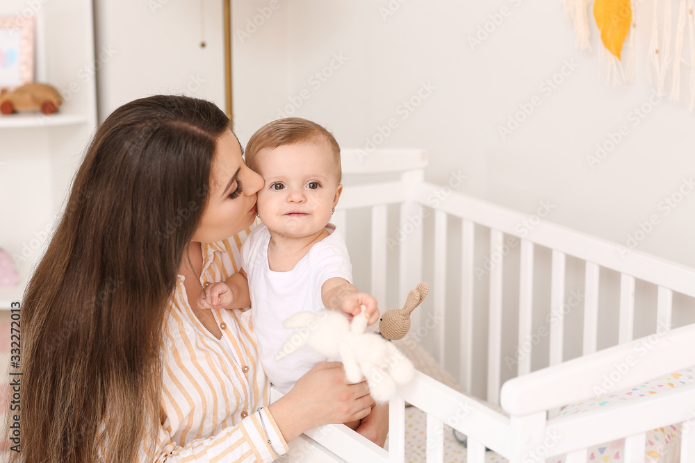 Happy mother with cute little baby at home Happy mother with cute little baby at home