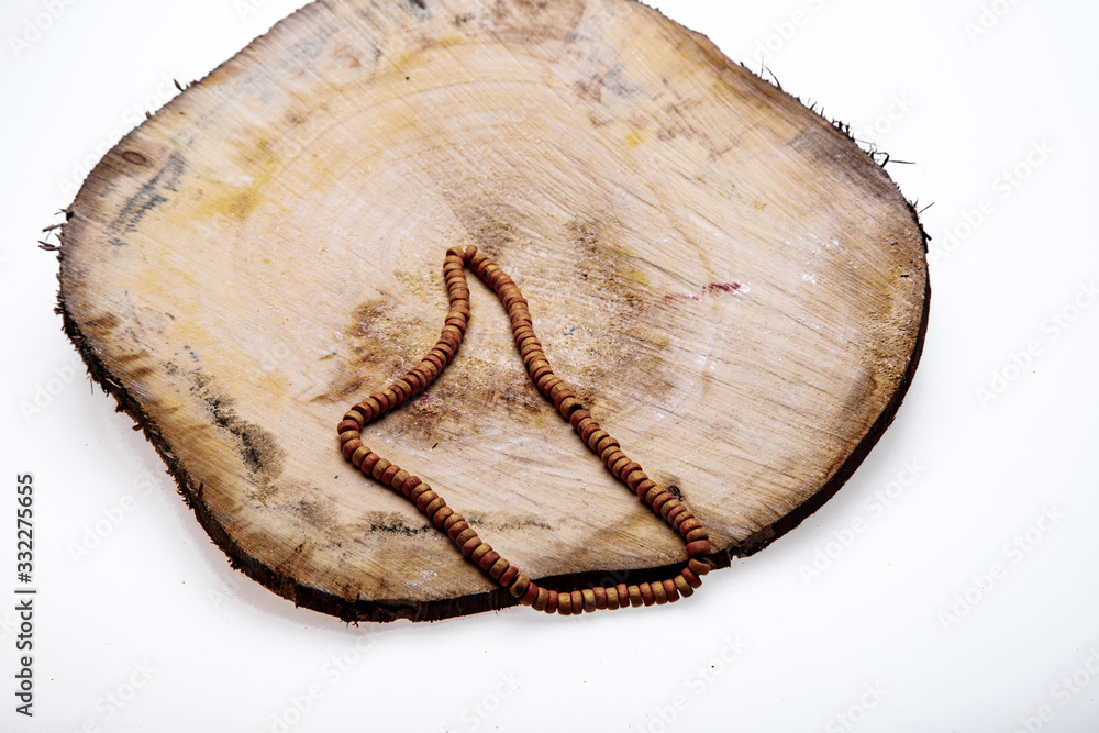 Bead bracelet on a wooden board.