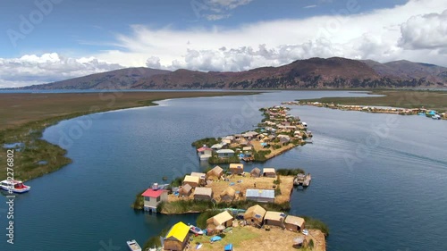 Aerial view of Uros Floating Islands (Spanish: Islas Uros ) on Lake Titicaca, the highest navigable lake in the world, near Puno, Peru, South America. photo