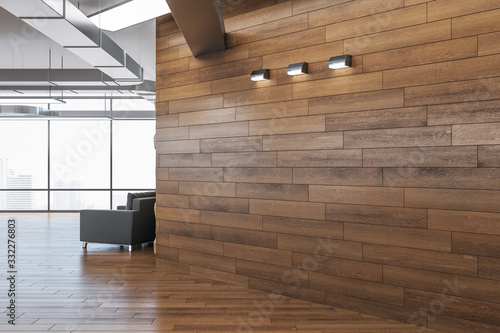 Modern office interior with blank wooden wall.