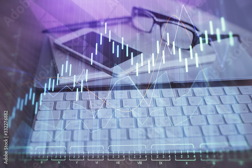 Double exposure of forex chart drawing and cell phone background. Concept of financial trading