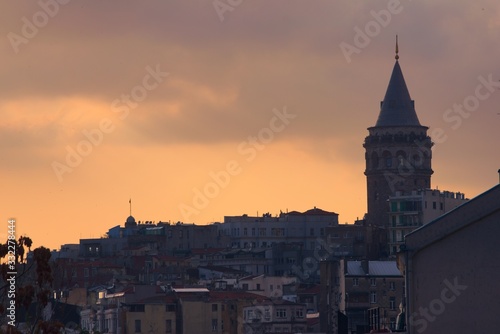 Galata Tower, in Istambul, Turkey, silhouetted against the twilight sky. © Hernan Schmidt