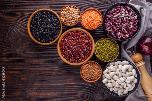 Fresh organic natural beans on wooden rustic background