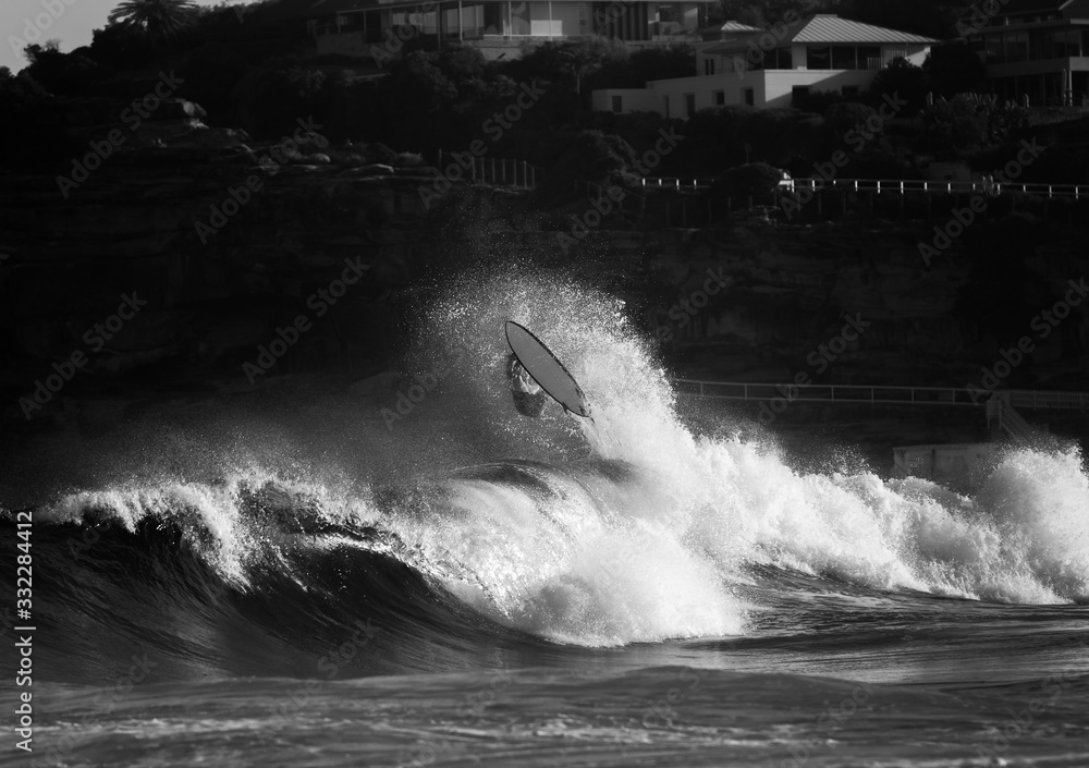 Black and white photo of a surfer wiping out, Sydney Australia