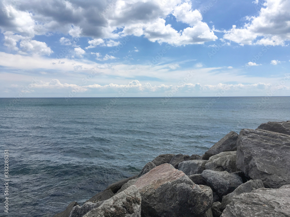 Sitting on a Rock Overlooking the Ocean View Sitting on a Rock Overlooking the Ocean View