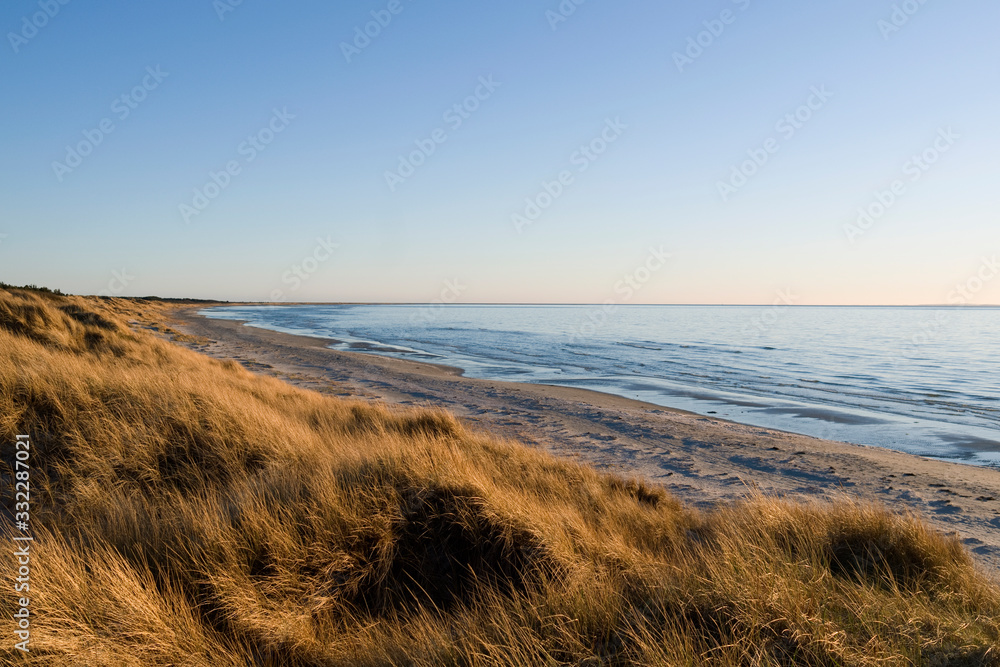 Laesoe / Denmark: Beautiful and calm coastline on the west coast of the island at low tide in the late April afternoon sun Laesoe / Denmark: Beautiful and calm coastline on the west coast of the island at low tide in the late April afternoon sun