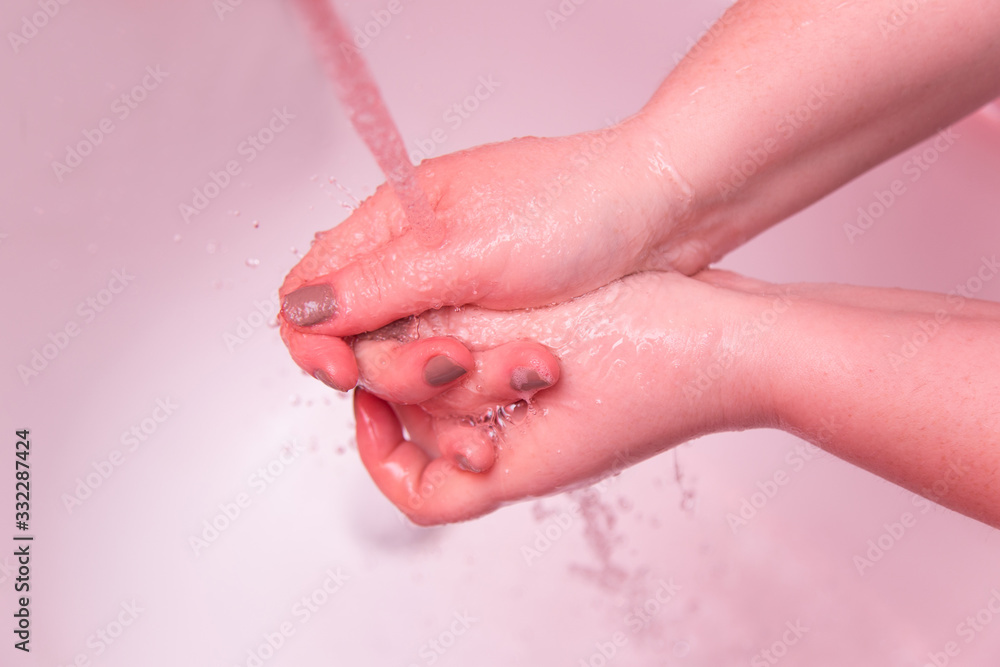 Fototapeta premium Corona virus travel prevention man showing hand hygiene washing hands with soap in hot water for coronavirus germs spreading protection. Covid-19