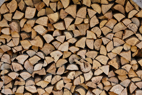 Firewood background. Old wooden texture.