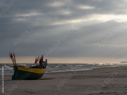Debki beach  colorful fishing boats at the seashore. Poland