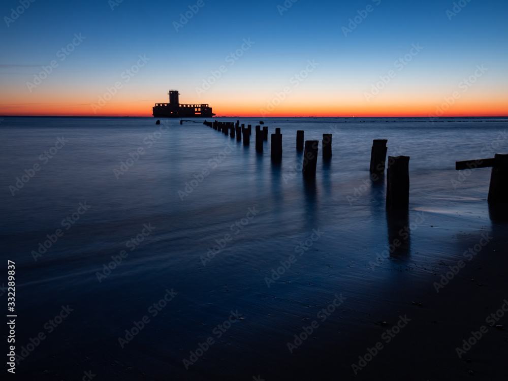 German's Torpedo Station, ruins from World War 2 at the sunrise. Long exposure photography. Gdynia, Poland.