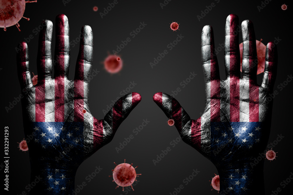 Danger concept from coronavirus, arms up with USA flag and flying bacteria Covid-19, on dark isolated background. horizontal frame Danger concept from coronavirus, arms up with USA flag and flying bacteria Covid-19, on dark isolated background. horizontal frame