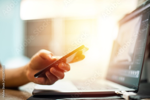 Hand with credit card with laptop shopping online concept. © toeytoey