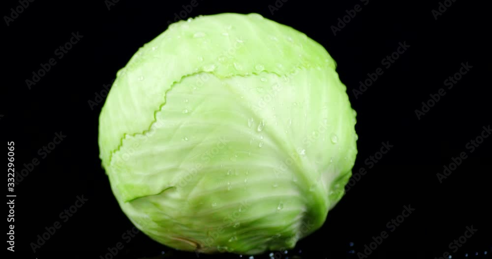 A forks fresh cabbage slowly rotates. A forks fresh cabbage slowly rotates.