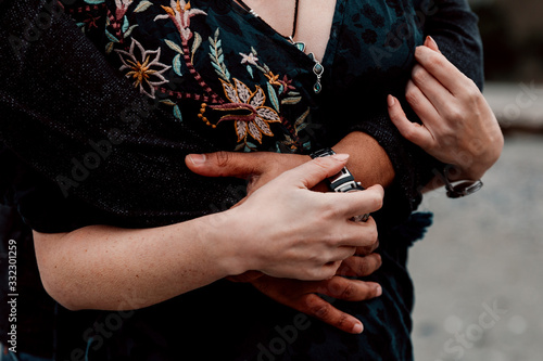 Couple Hugging Holding Hands