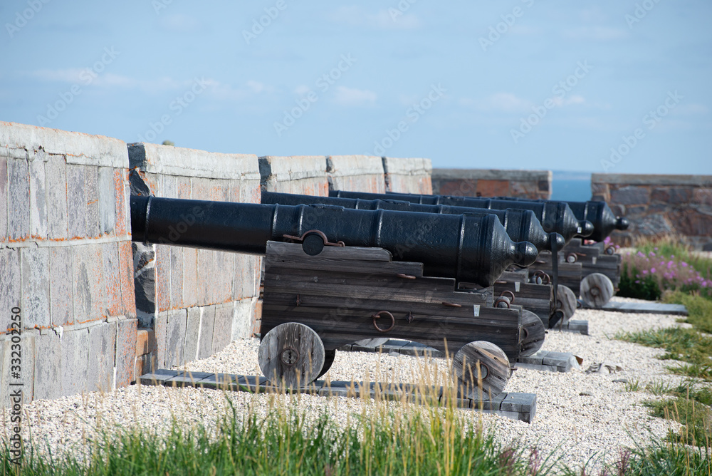old cannons on a fortress wall in northern canada old cannons on a fortress wall in northern canada